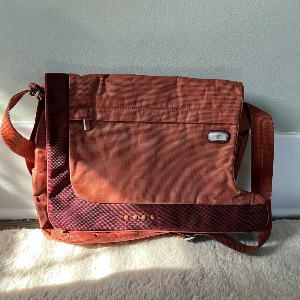 Tumi T-Tech Messenger Bag - Rust color with light blue inside
